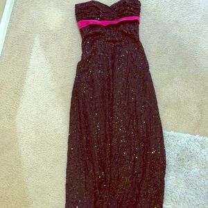 Full length black sequined strapless formal gown